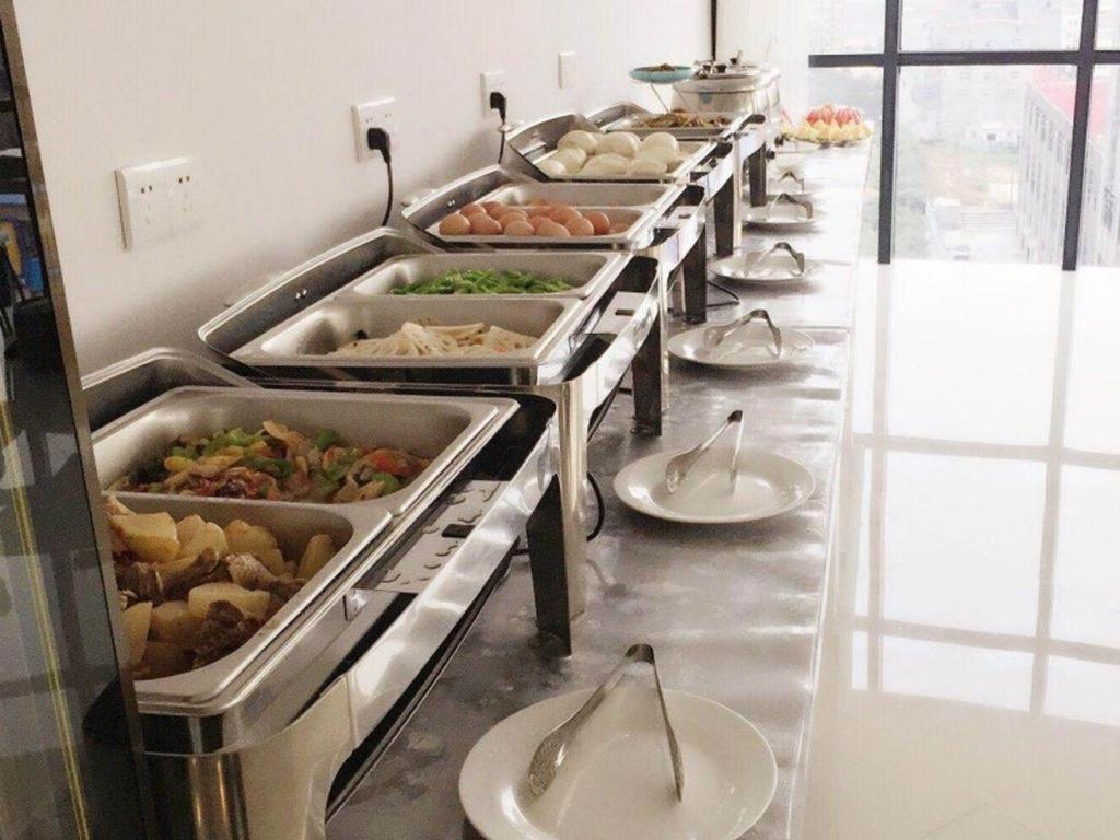 Greentree Inn Zhengzhou Xinzheng City Longhu Town Xiangyun Road Express Hotel Buitenkant foto